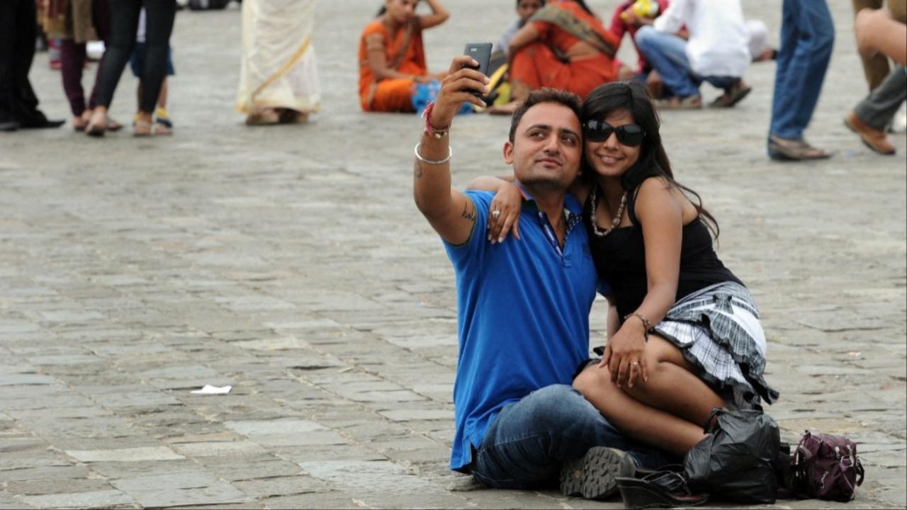 Gateway of India witnesses a crowd indulging in countless selfies each day. Only a few choose to get photographed by resilient photographers at Mumbai’s heritage site.  Photo Courtesy: AFP