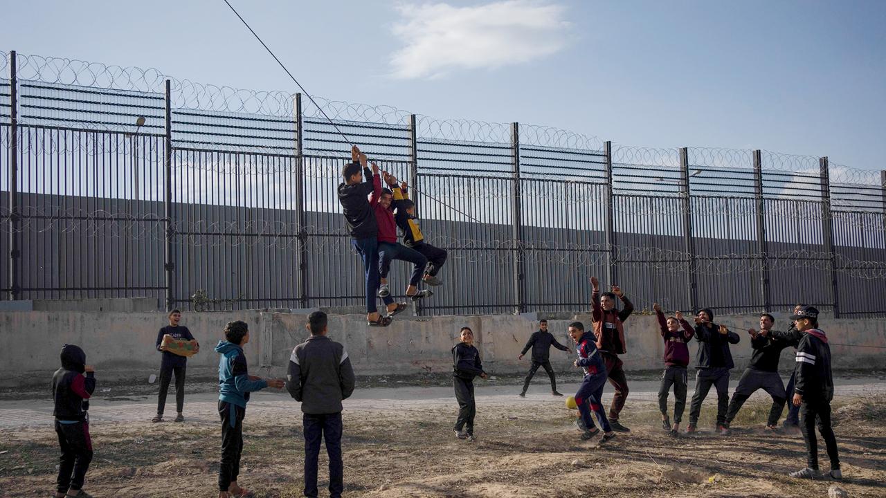 Displaced Palestinians play next to the border with Egypt. Pic/AP
