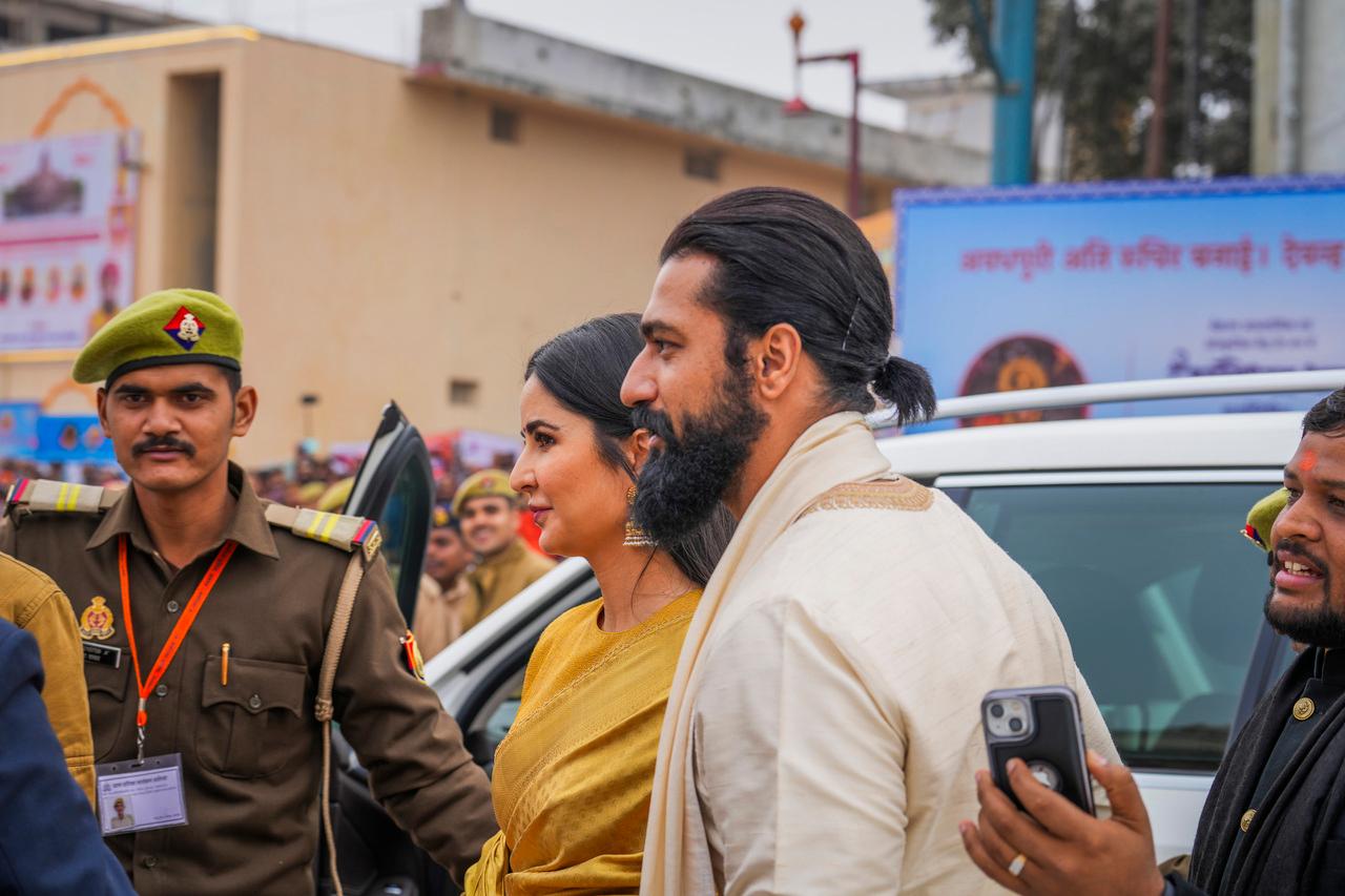 Bollywood's star couple Vicky Kaushal and Katrina Kaif were seen together at the Pran Pratishtha ceremony. While Katrina wore a golden saree, Vicky was seen in a cream-coloured kurta pajama