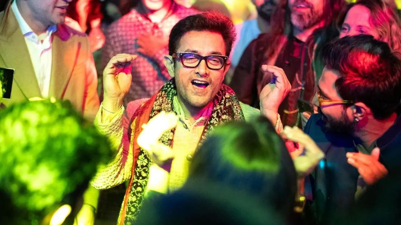 Bride's father Aamir Khan was at the forefront of all the festivities. Videos of Aamir Khan dancing to all songs at the sangeet went viral (Pic/David Poznic)