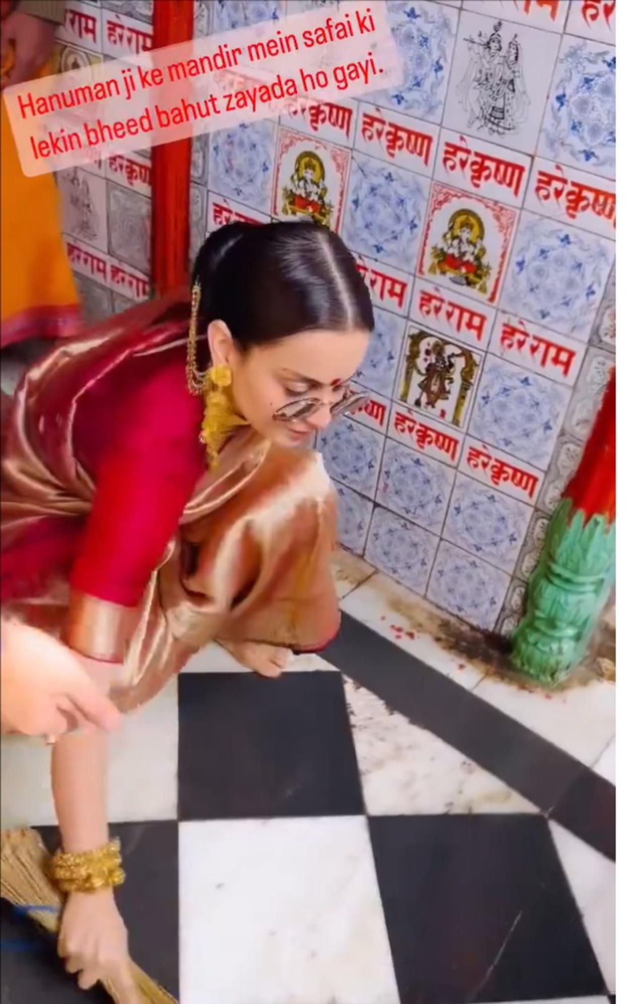 Taking to her Instagram Stories on Sunday, Kangana shared a video from Ayodhya in which she is seen sweeping the floor of a temple while still in her traditional ensemble and sunglasses