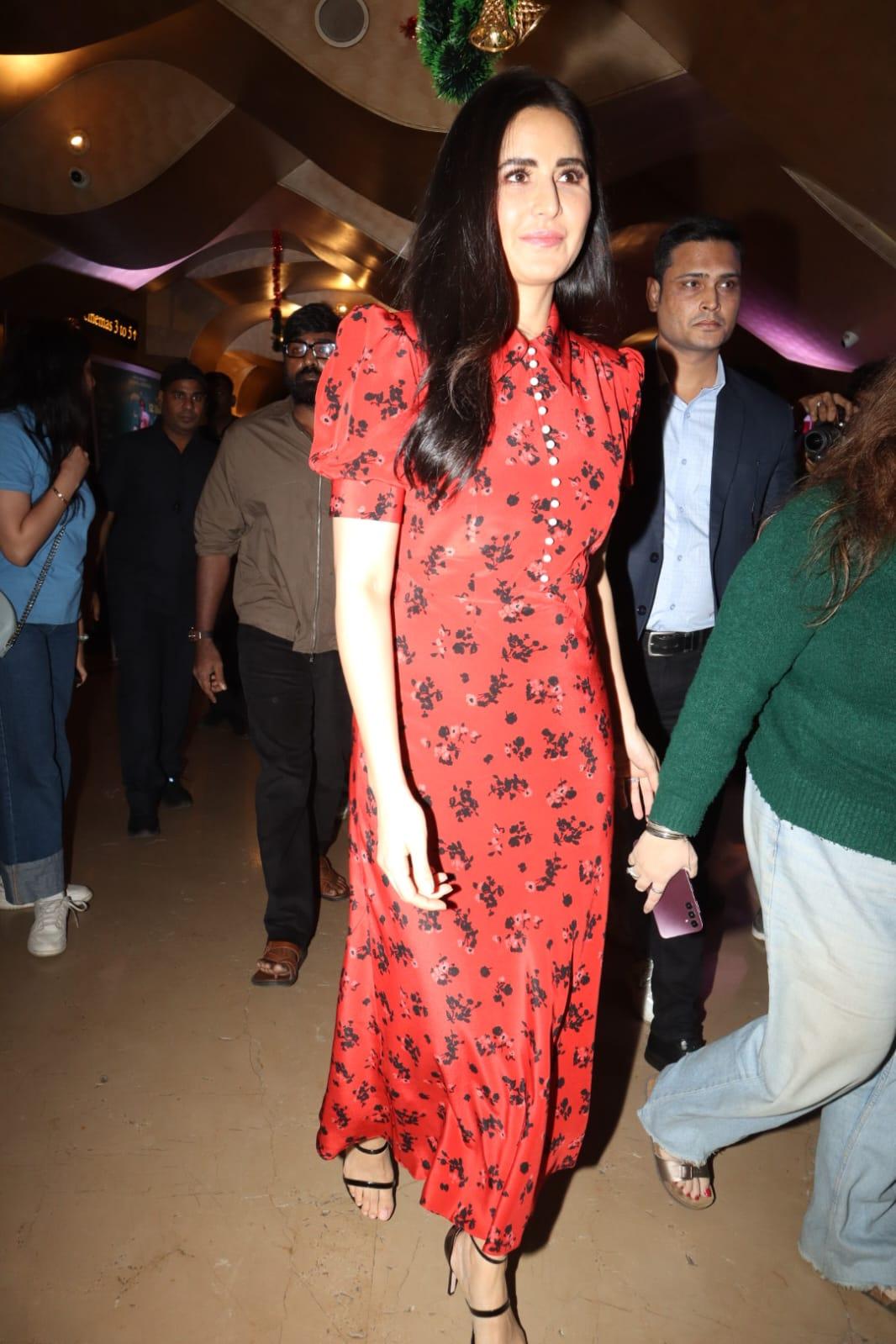 Actress Katrina Kaif dressed in a red dress with floral prints, in keeping with her character from the film