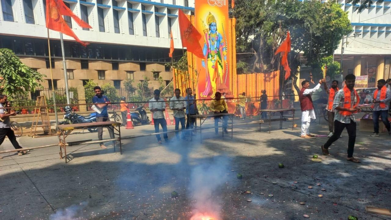 The Mumbai BJP workers were seen bursting firecrackers outside party's office in Churchgate on Monday afternoon. Pics/Sameer Abedi