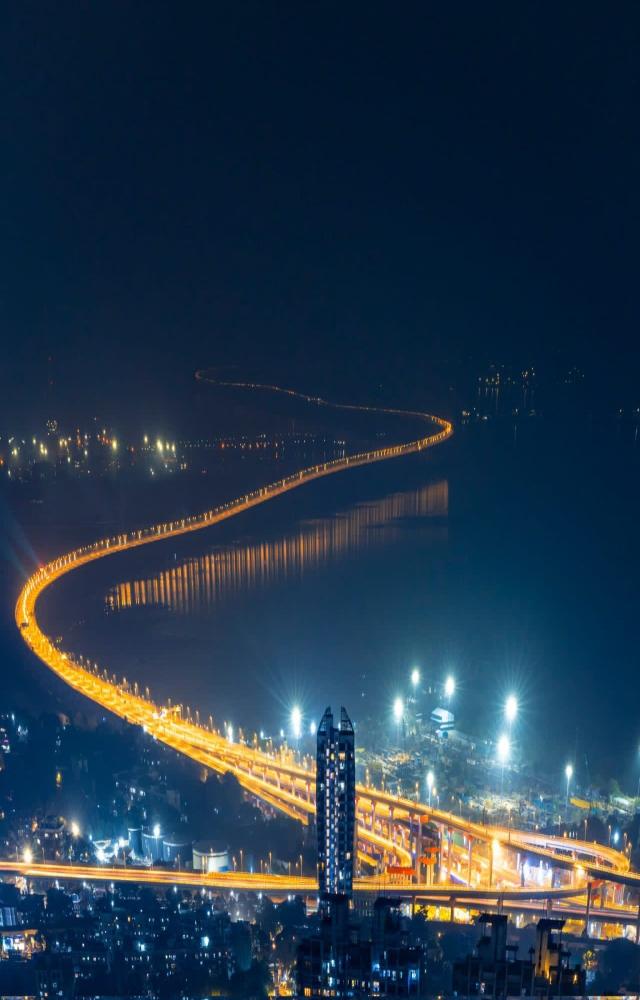 The Mumbai Trans Harbour Link spans six lanes, covering 16.50 kilometers over the sea and an additional 5.50 kilometers on land. To support the project's costs, the Maharashtra government has approved a one-way toll of Rs 250 for cars using the Mumbai Trans Harbour Link. Toll charges for return journeys and frequent travelers will vary, subject to revision after a one-year review from the start of operations, according to the Maharashtra cabinet's decision.