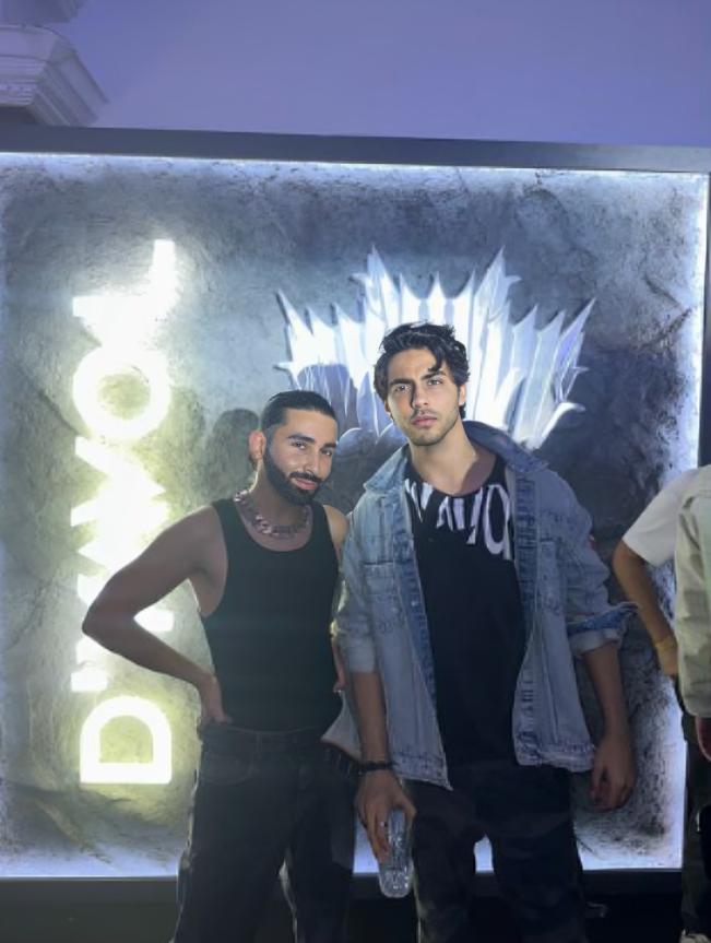 Orry and Aryan Khan looked stylish as they posed in front of Aryan's brand 'D'Yavol' workshop signage