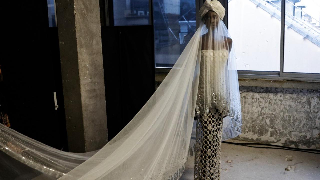A model poses backstage prior to presentation of the Rahul Mishra collection as part of the Women's Haute-Couture Spring/Summer 2024 Fashion Week in Paris on January 22, 2024. (Photo by GEOFFROY VAN DER HASSELT/AFP)
