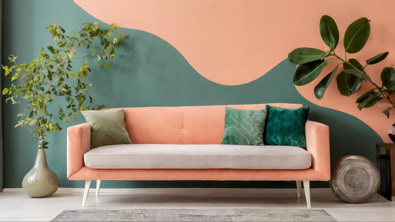 Consider painting an accent wall in Peach Fuzz combined with other complementing colours. This can instantly set an inviting tone for the whole room.  