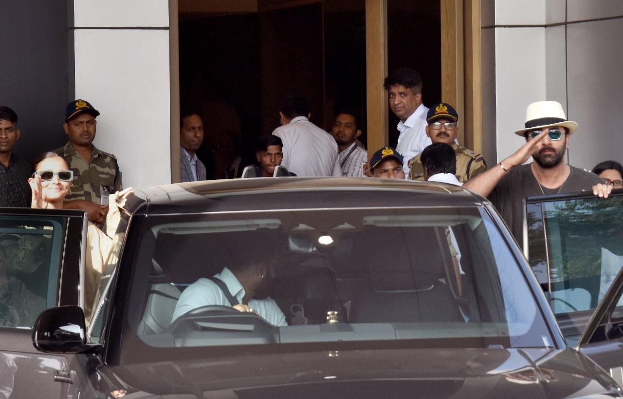 Alia Bhatt joined her husband to wave to the paparazzi stationed outside the airport