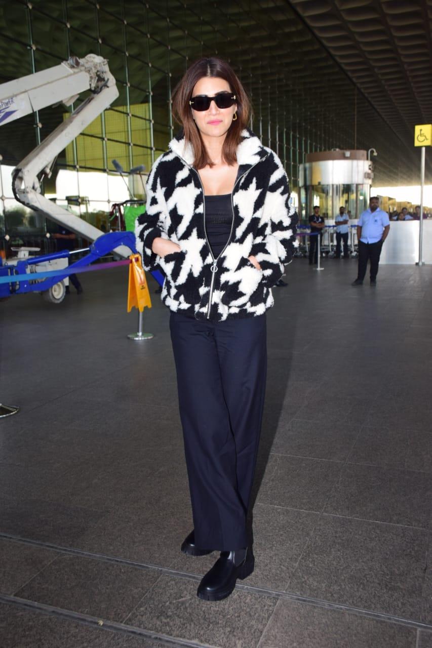 Kriti Sanon was snapped at the airport in comfy and stylish black and white outfits