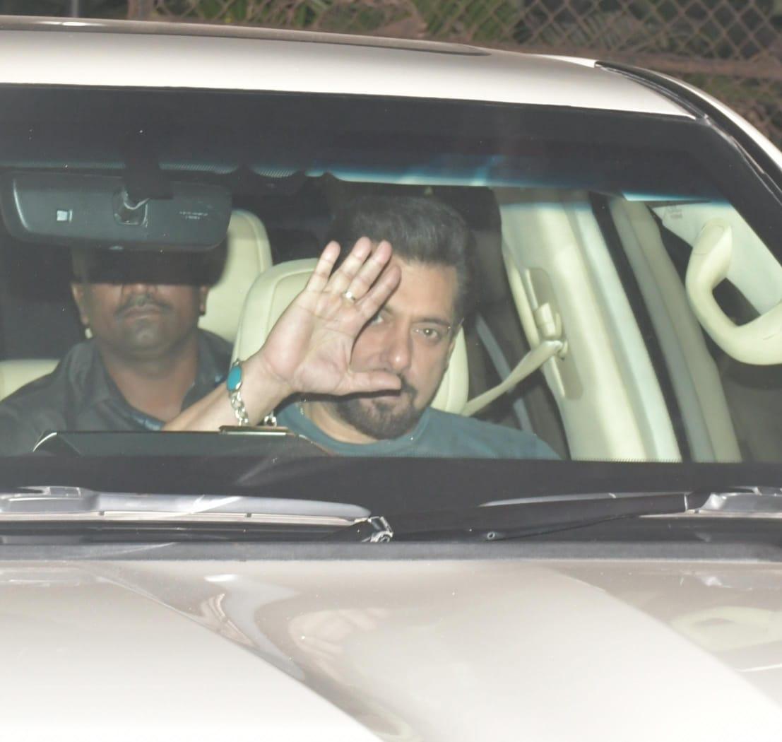 The actor waited until he was seated inside his car to greet the paparazzi who were waiting for him