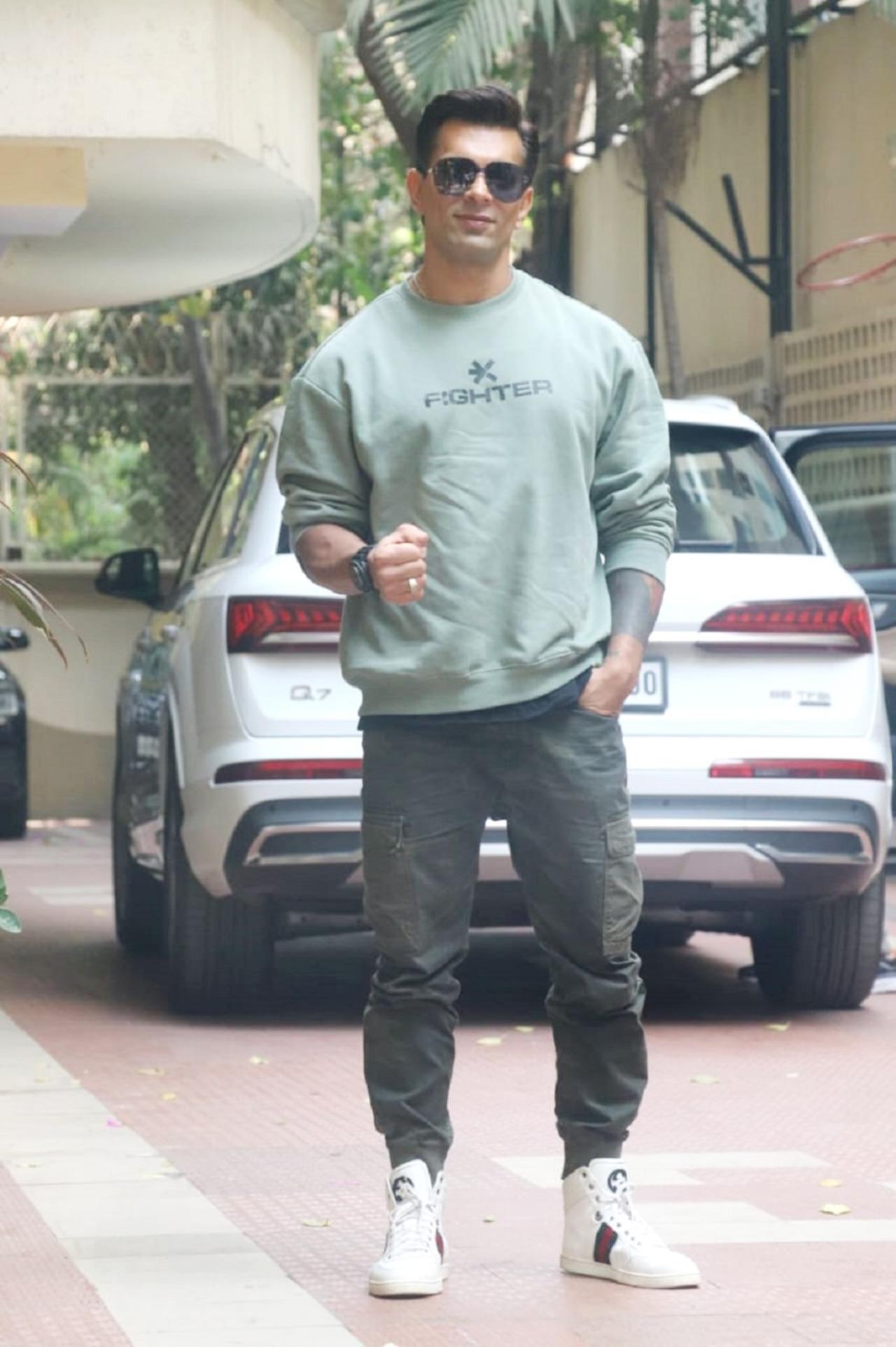 Karan Singh Grover strikes a pose for the paparazzi. He is currently basking in the success of his film 'Fighter'