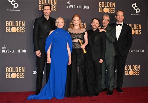US actor Nicholas Braun, US actress J. Smith-Cameron, Australian actress Sarah Snook, US actor Kieran Culkin, US actor Alan Ruck and British actor Matthew Macfayden pose in the press room with the award for Best Television Series - Drama for 