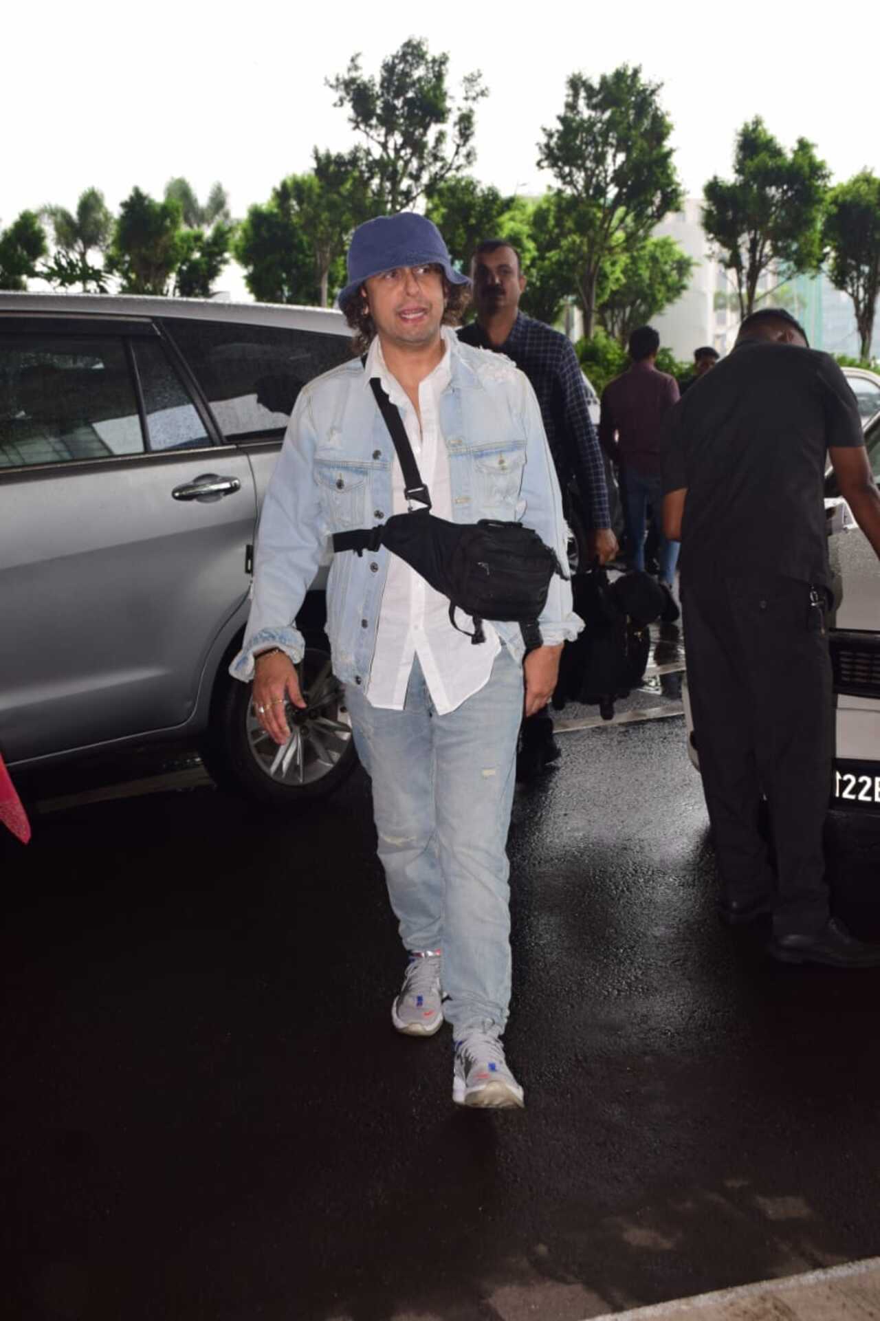 Singer Sonu Nigam spotted in an all-denim look and bucket hat at the airport