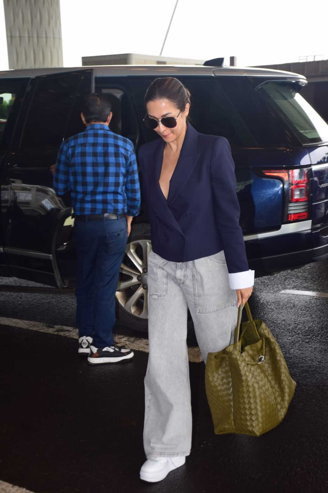 Malaika Arora was also snapped at around the same time as Arjun at the airport. Are the two back together? 