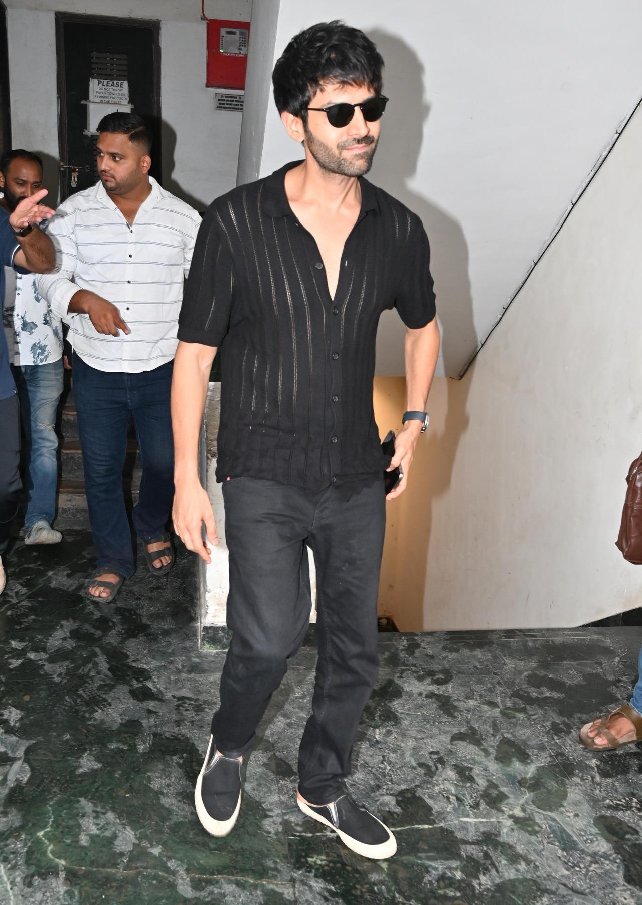 Kartik Aaryan was spotted in a sheer black shirt at a dubbing studio