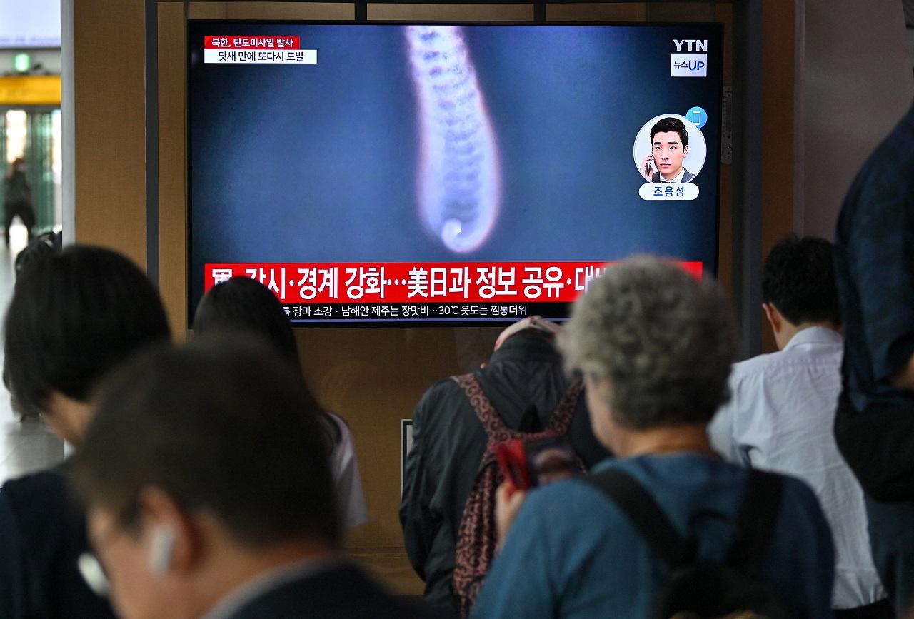The reports said the first missile landed in the waters off the North's eastern city of Chongjin