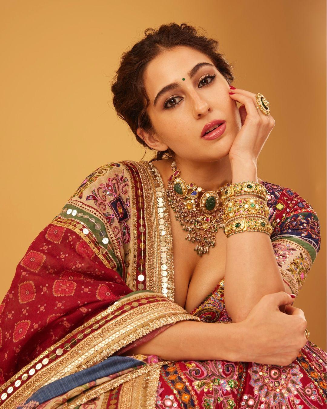 The actress tied her hair in a messy hairstyle and put on elaborate accessories, including a necklace, bangles, and a beautiful ring