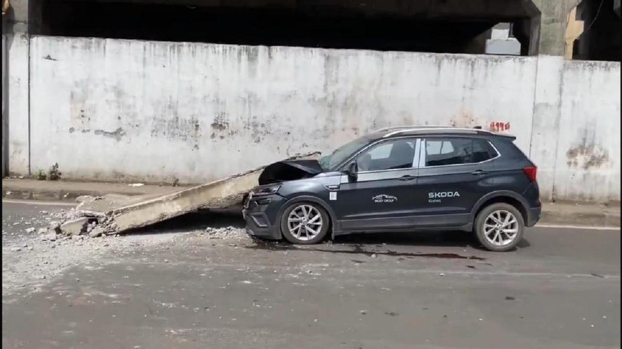 Mumbai: Flyover slab falls on car bonnet in Andheri