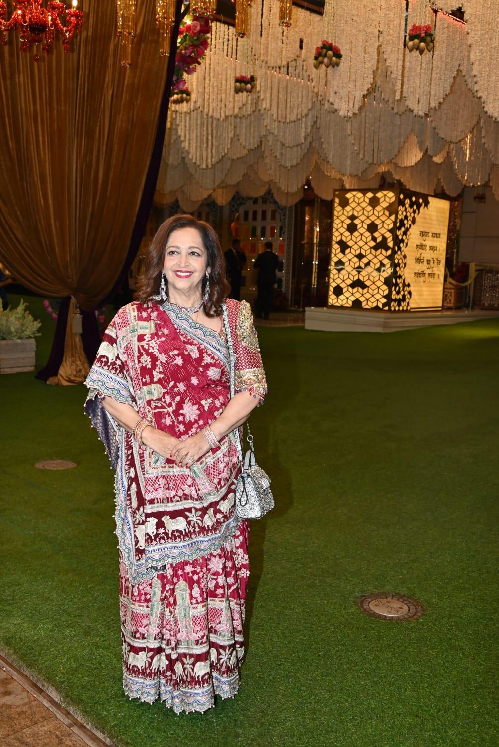 Isha Ambani's mother-in-law Swati Piramal wore a stunning red saree for Radhika & Anant's haldi ceremony