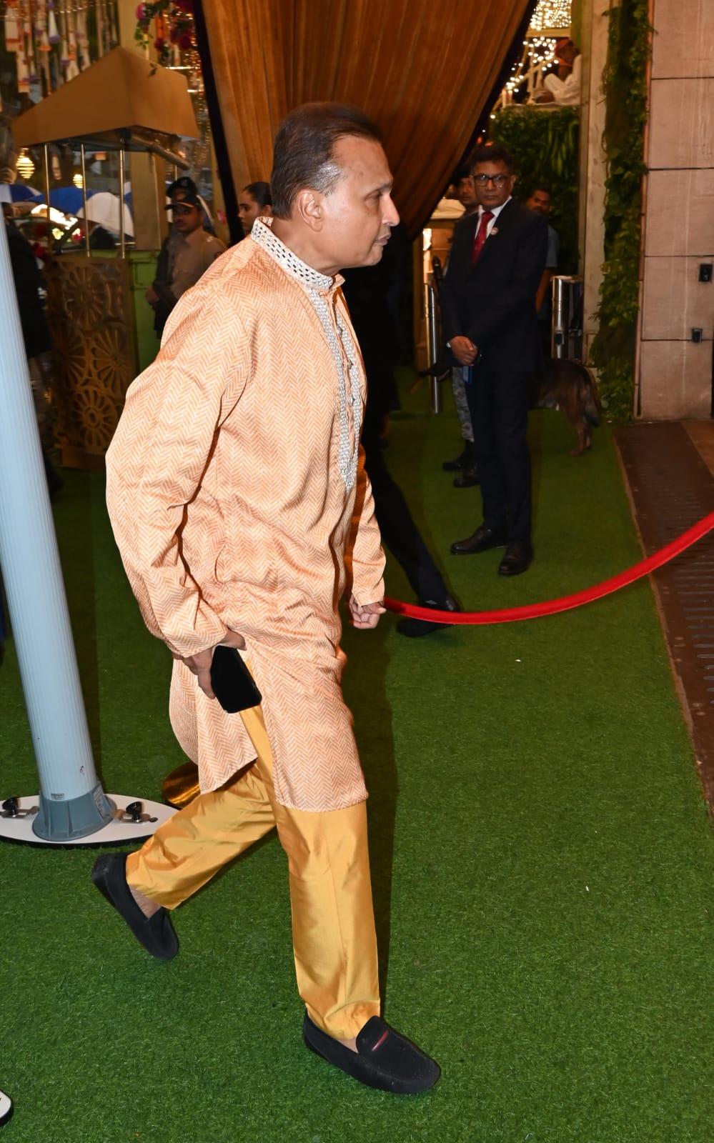 Anil Ambani was snapped entering the venue in yellow kurta pared with matching payjama