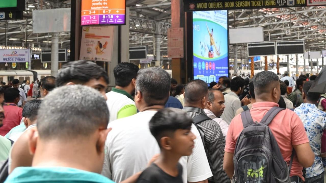 Hundreds of commuters were seen walking on the railway tracks following a signal failure at CSMT