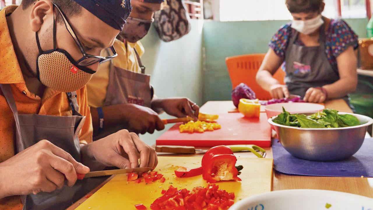 Neurodiverse chefs at work in the Juhu-based café