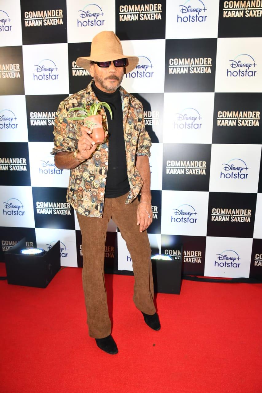 Jackie Shroff struck a pose with a cute plant in his hand as he attended the screening of Gurmeet starrer