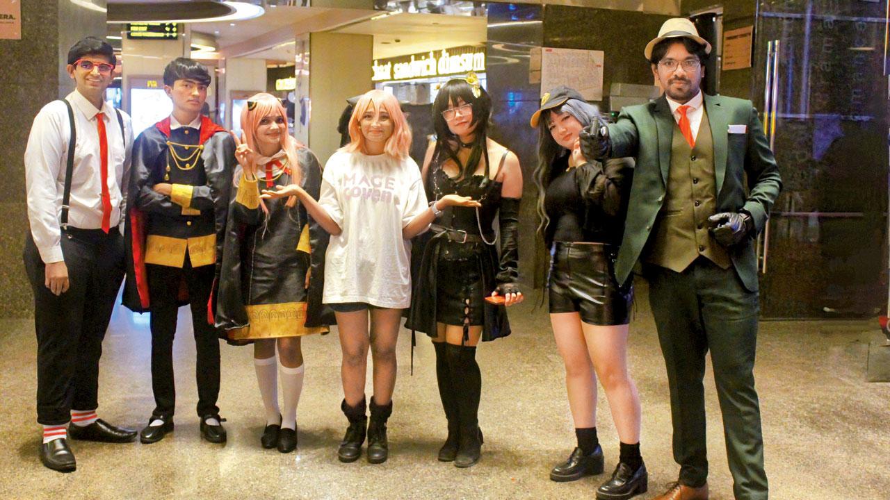 Dakshita Pawar (centre) cosplays with the team at the screening