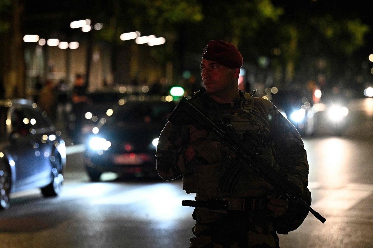 About 18,000 members of the military are also helping ensure security, including thousands housed in a huge, special camp erected on the edge of Paris