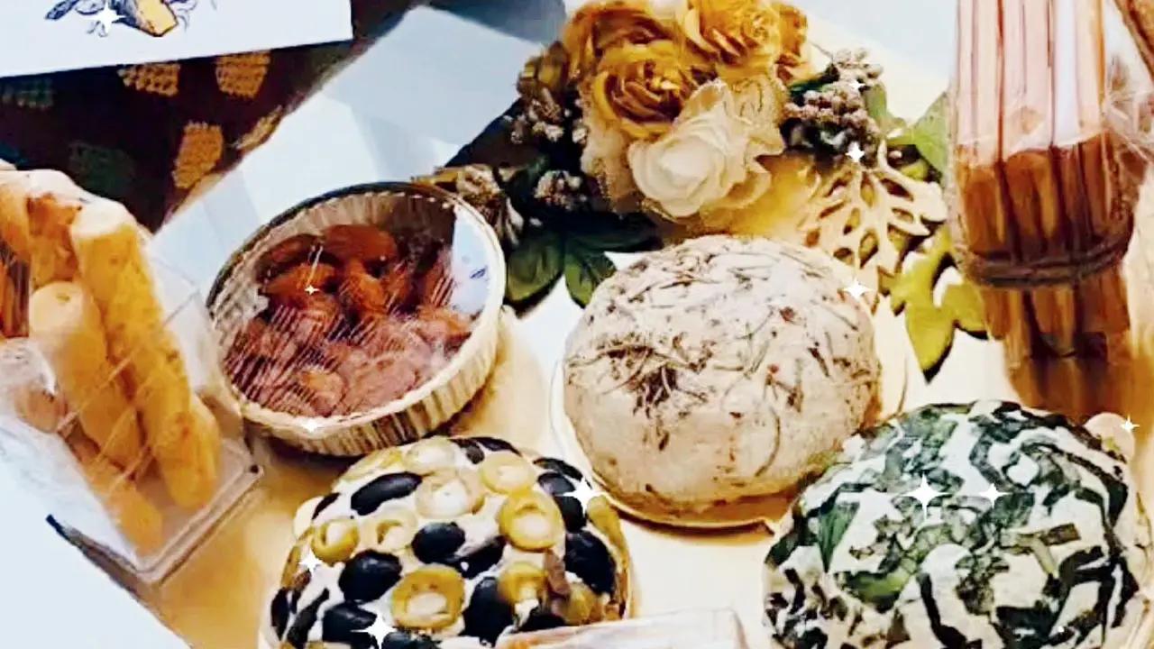 The Cheese Board offers handmade cream cheeses with gourmet toppings like Italian herbs, olives, and fig and pistachio, as well as a fromage board featuring cheddar, gouda, edam, and Monterey Jack. Each board is complemented by almond apricot pâte, Mexican salsa dip, an assortment of crackers, lavash, herb sticks, dry fruits, and sourdough slices.AT The Cheese Board,  Almeida Park, Bandra West. LOG ON TO @cheese_boardCOST Rs 900 onwards