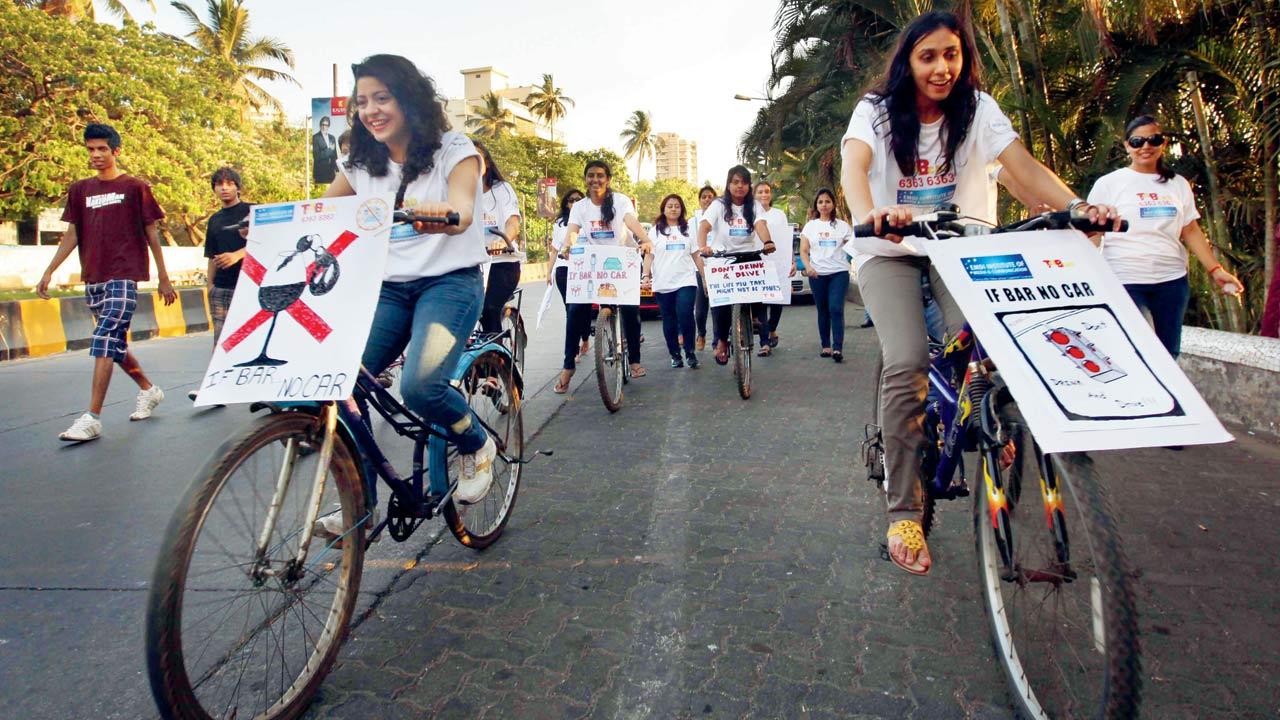 A group of young Mumbaikars on a cycle march against drinking and driving at Carter Road in Bandra in 2013, carry posters that read If Bar, No Car. File pic/Getty Images