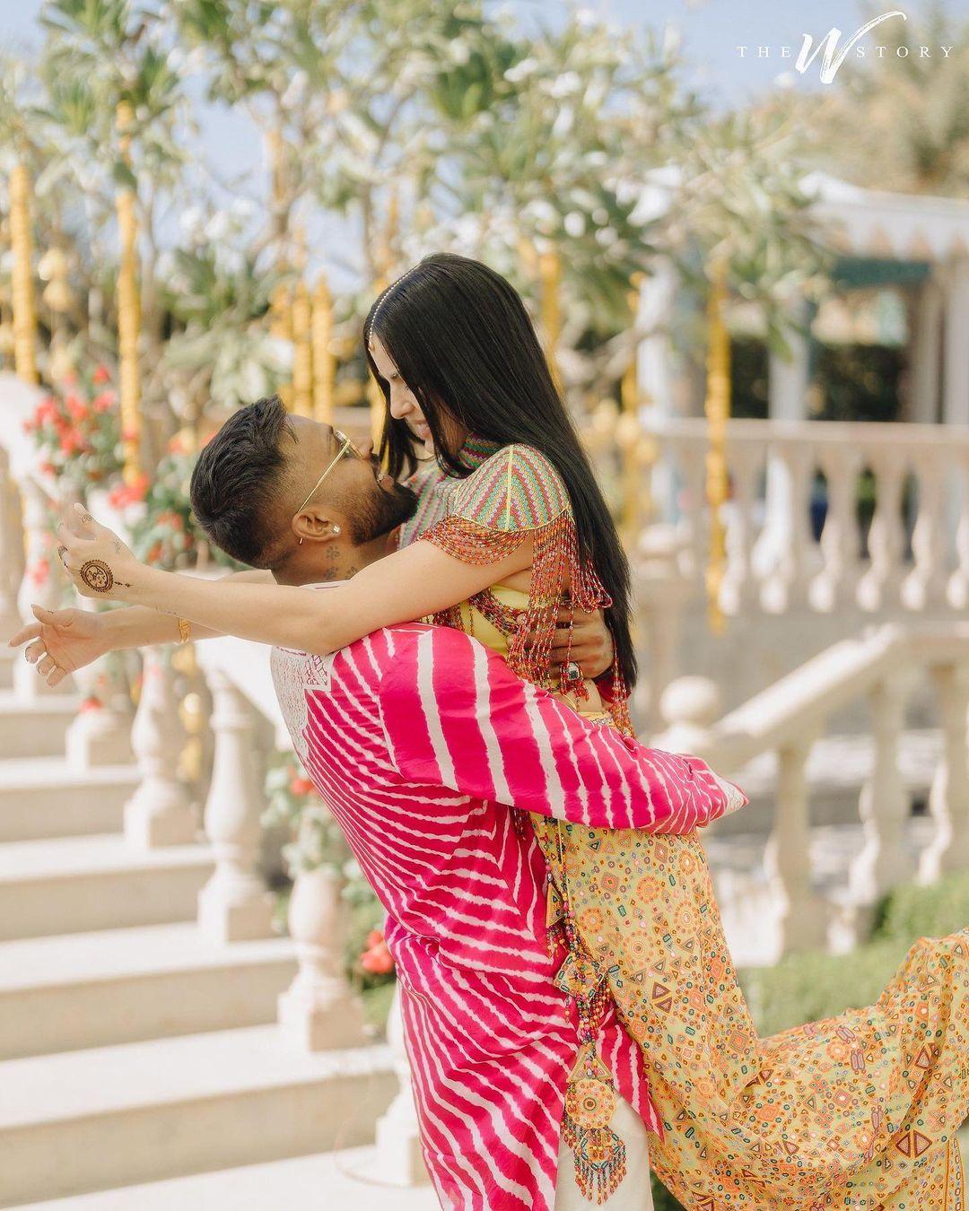 In this picture, the couple was all smiles as they applied Shagun ki haldi on their faces