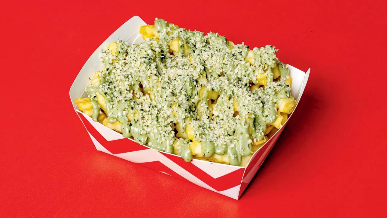 Ditch regular salted fries and try out the crispy crinkle hemp fries with hemp mayo and hemp seeds. Golden-brown crinkle-cut fries, perfectly crispy on the outside and fluffy on the inside, served with a creamy hemp-infused mayo that adds a nutty, slightly earthy flavour. These are topped generously with toasted hemp seeds for a crunch.AT KHA- Burgers, Fries and Fried Chicken, multiple locations (Andheri West, Malad West, Mira Road, Kalyan, Wadala, Borivali, Versova, Kandivali East, Chembur, Bandra).TIME 12 pm to 12 amCALL 9076043503 COST Rs 129