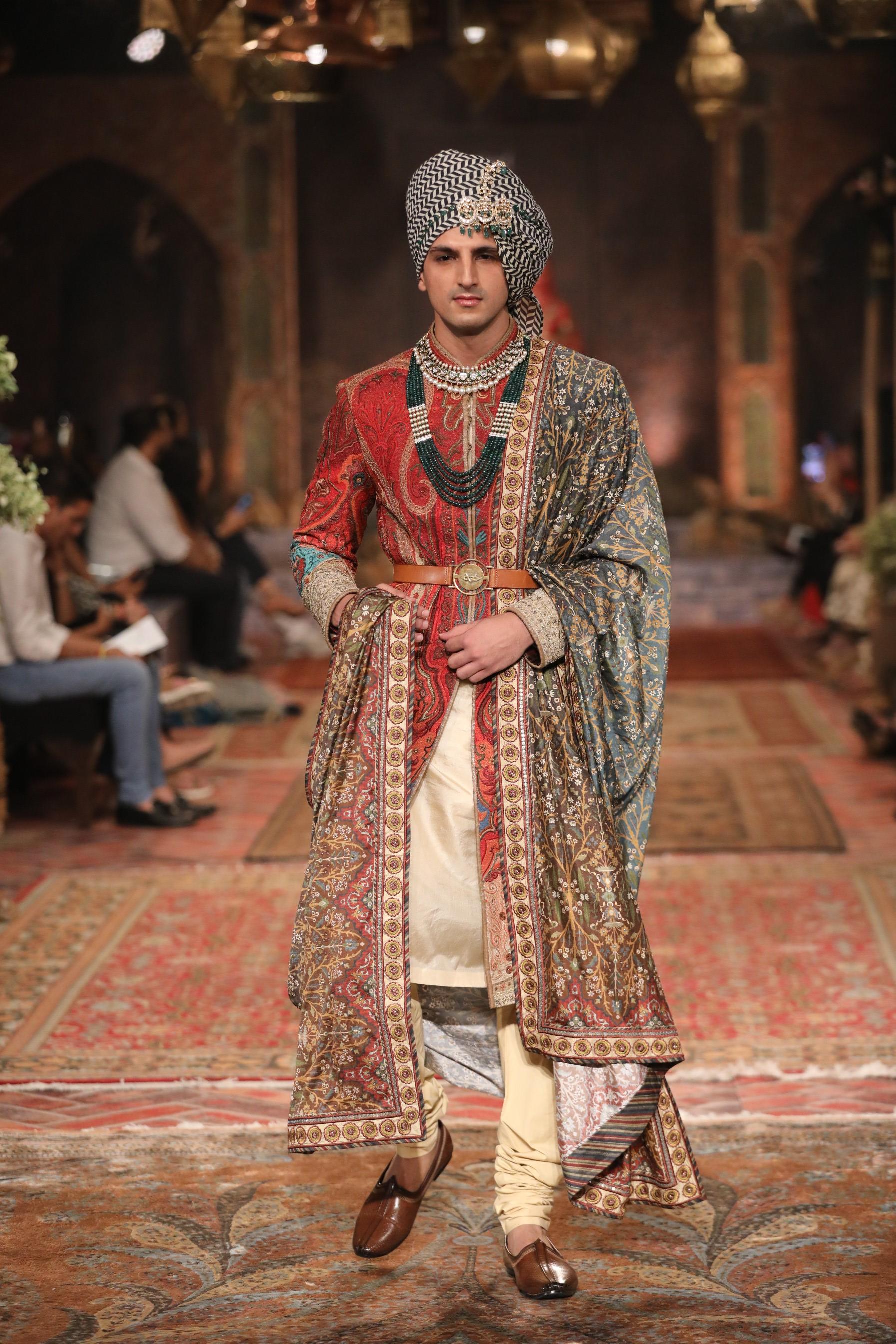 This season's 60-piece collection showcases a fusion of rich textiles, fine crafts, and exquisite detailing across three distinctive themes