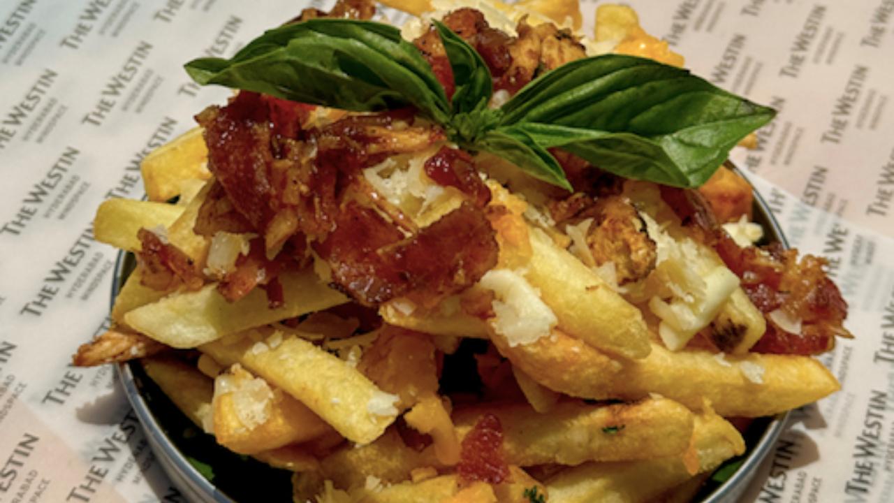 Indian-Inspired Loaded French Fries - Spice Temple Fries Giving an Indian touch to the Belgium-origin dish, chef Prem Pogakula, executive chef at The Westin Hyderabad Mindspace says you can make the Indian-inspired loaded French fries. With a mix of paneer, green peas, onions, tomatoes, and even garam masala powder, Pogakula, says it is an array of scrumptious ingredients that are perfect during the monsoon season.