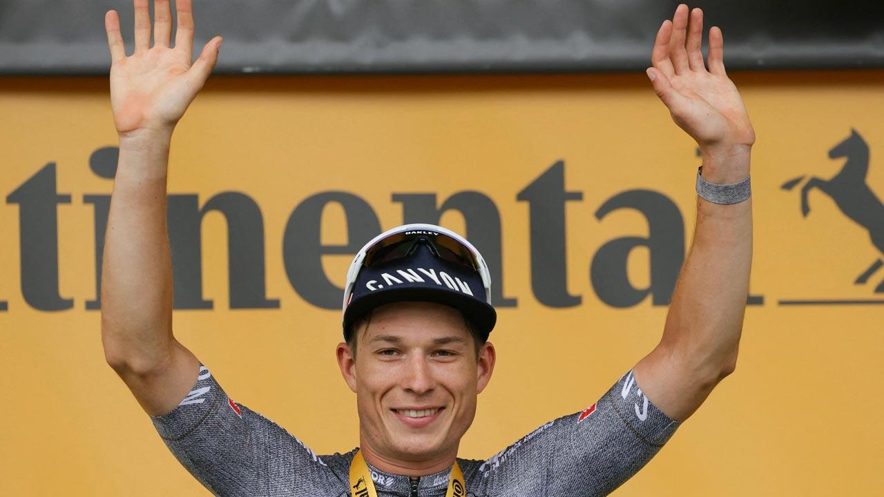 Alpecin-Deceuninck team`s Belgian rider Jasper Philipsen celebrates on the podium after winning the 13th stage of the 111th edition of the Tour de France cycling race, 165,3 km between Agen and Pau, southwestern France. Pic/AFP