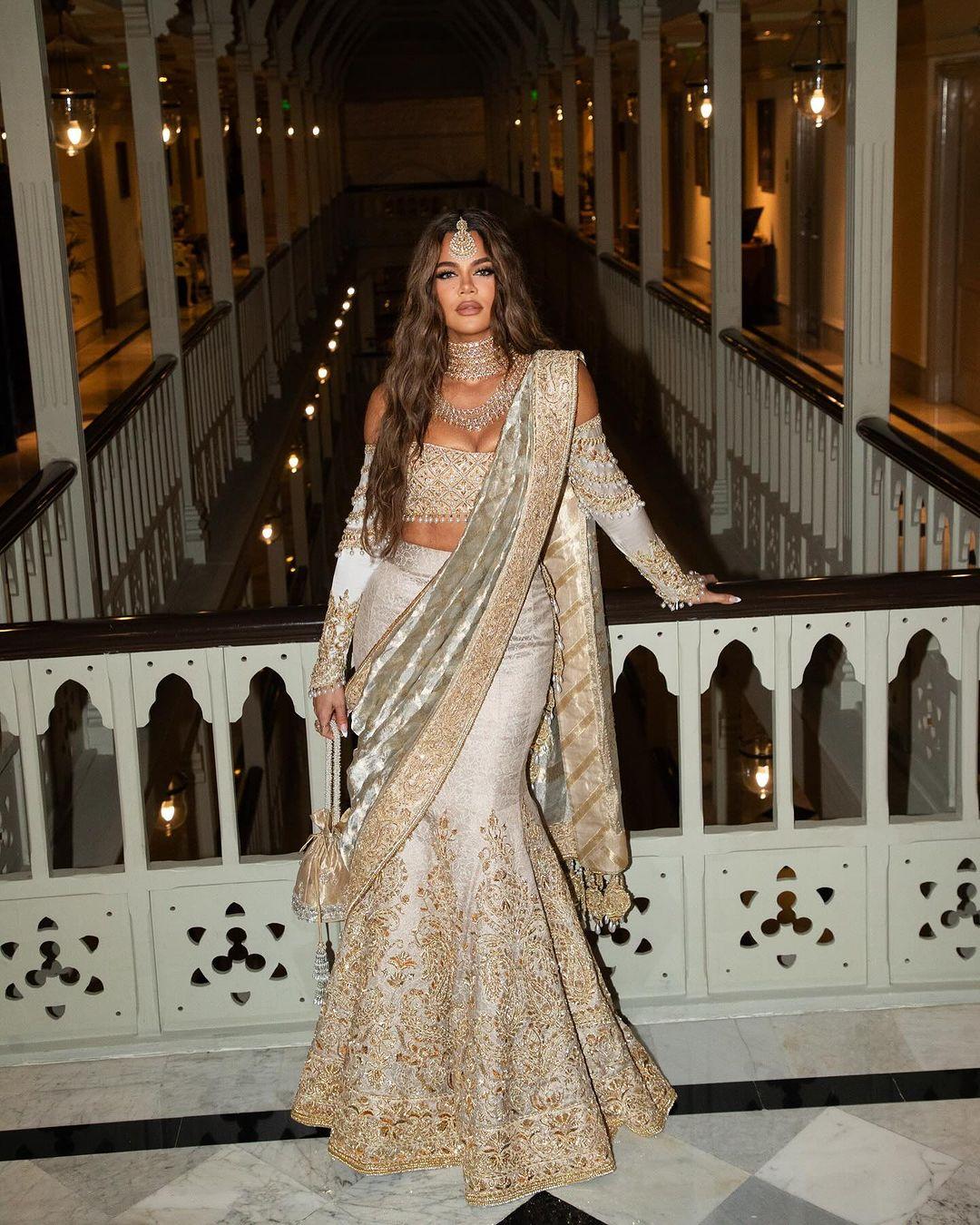 Kardashian chose a heavily embroidered ghagra and paired it with an off-shoulder blouse. Khloe paired the lehenga choli with a matching yet stylish dupatta