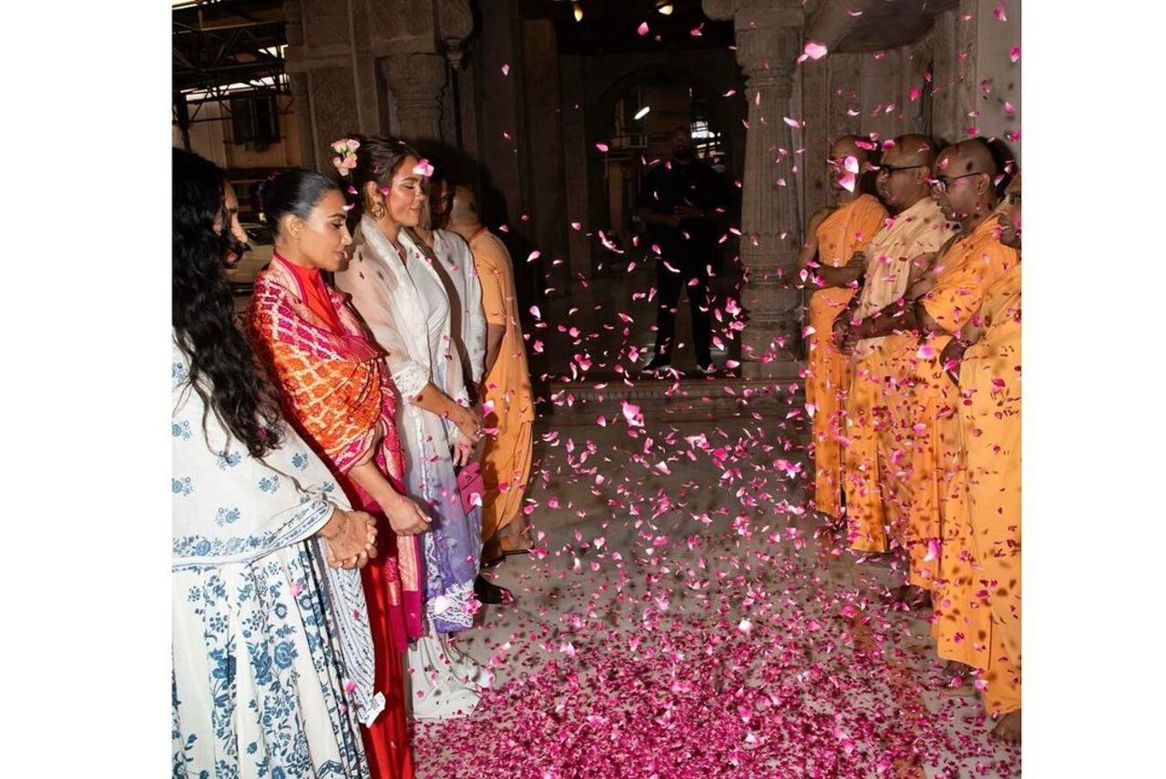 Kim and Khloe were welcomed with a shower of flower petals
