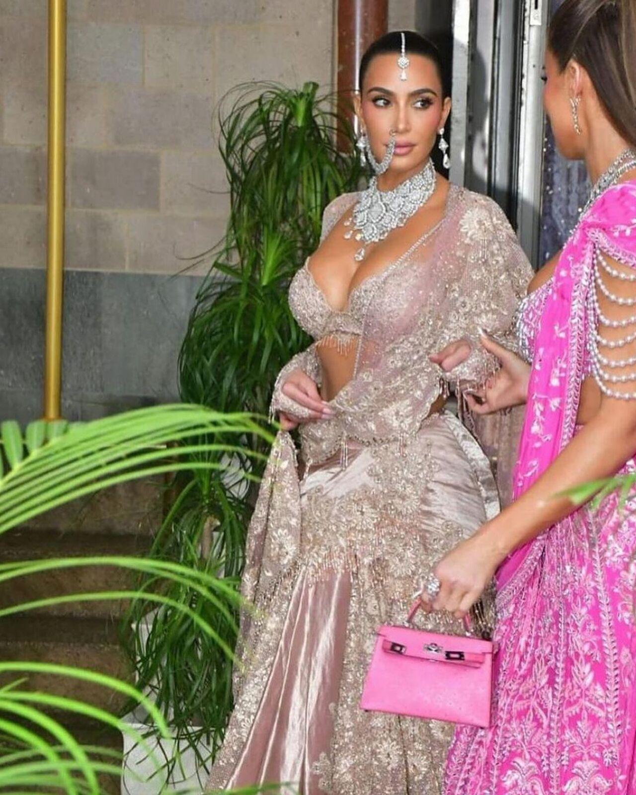 Kim Kardashian's first look for the day was by Tarun Tahiliani. The global icon wore a custom Tarun Tahiliani lehenga adorned with Swarovski crystals