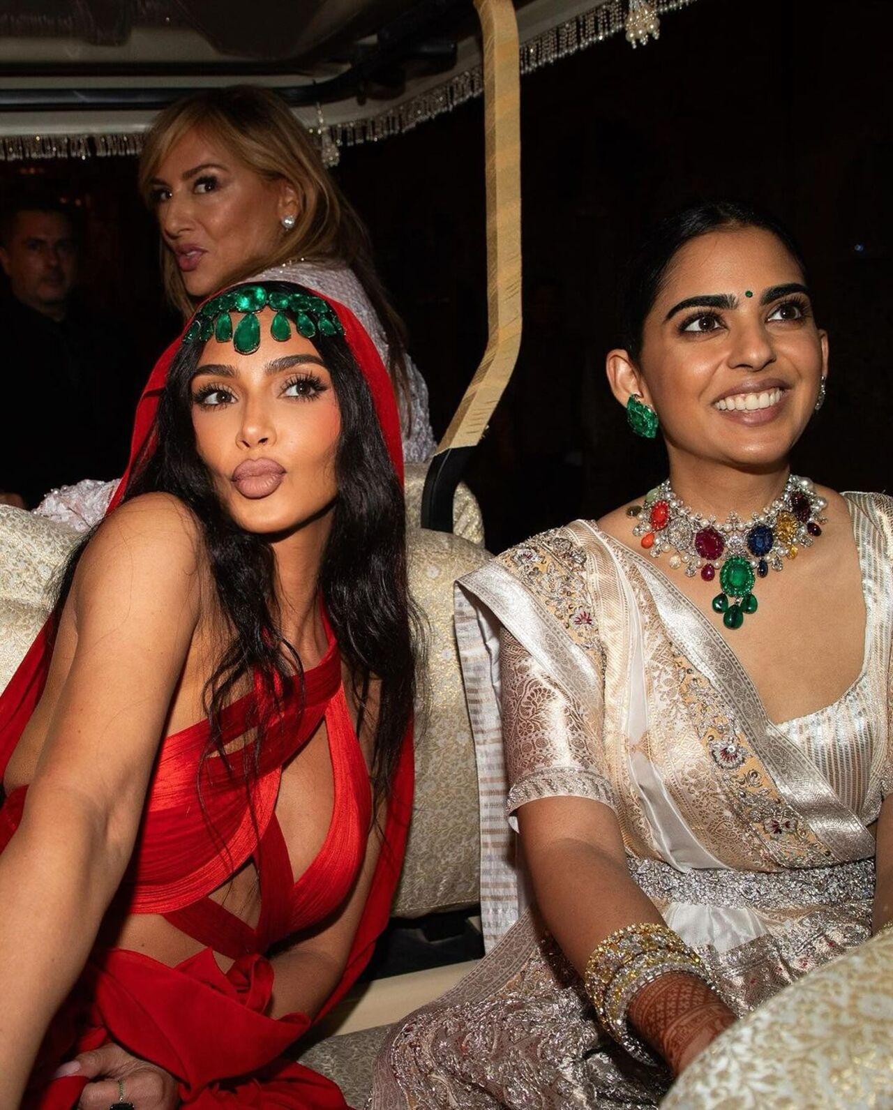 Kim also posed with the groom's sister, and a diva herself, Isha Ambani, at the Shubh Aashirwad ceremony