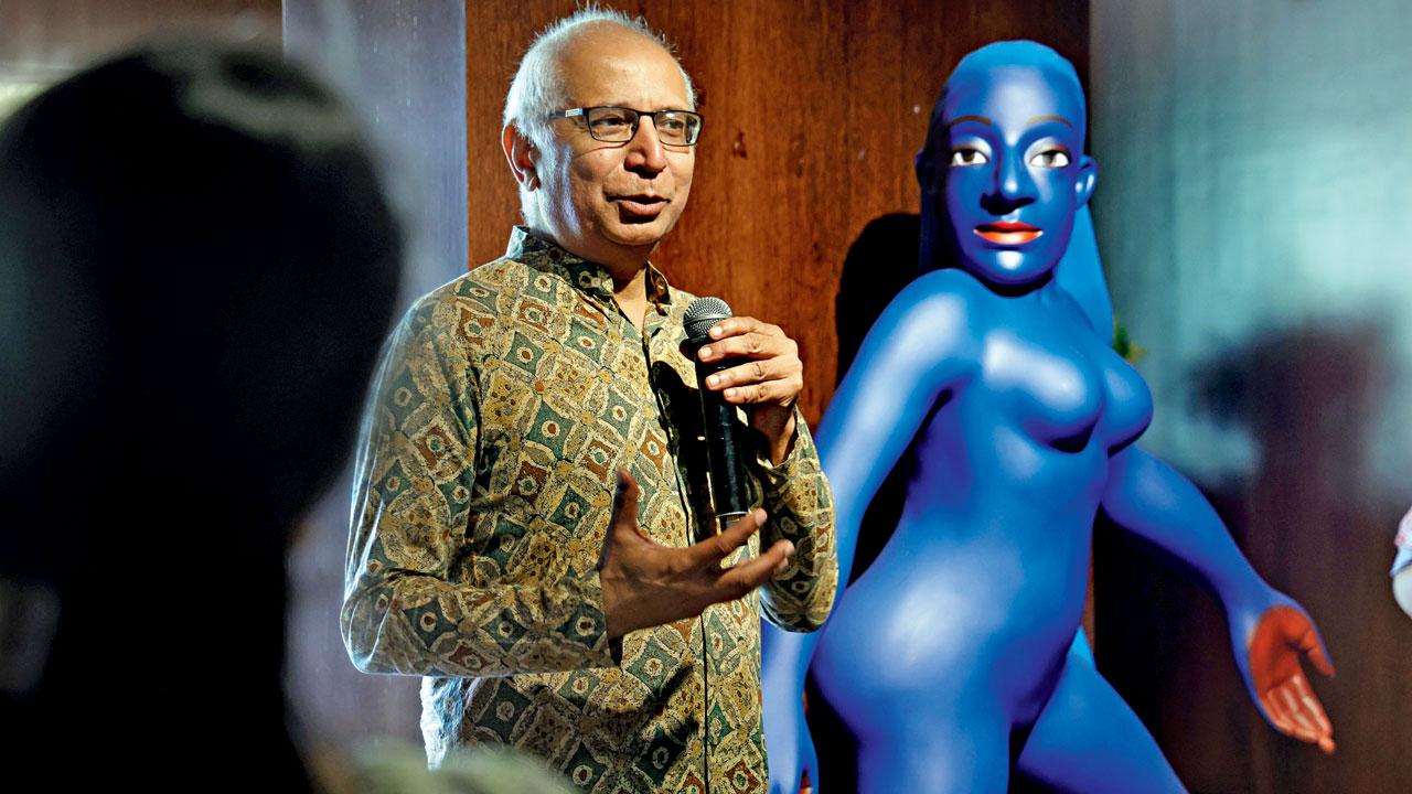 Kishore Singh with the artist’s sculpture, I Will Draw My Own Laxman Rekha, in the background