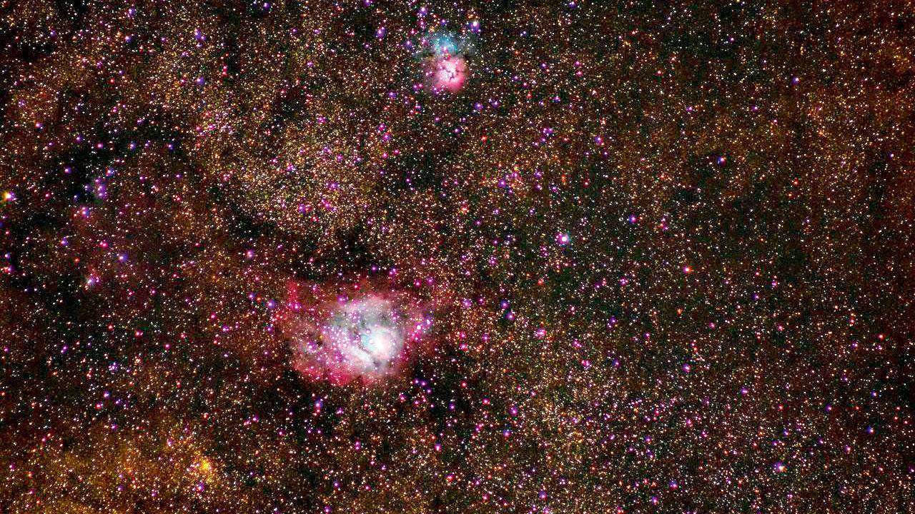 A clear image of the Lagoon and Trifid nebula processed by AI software
