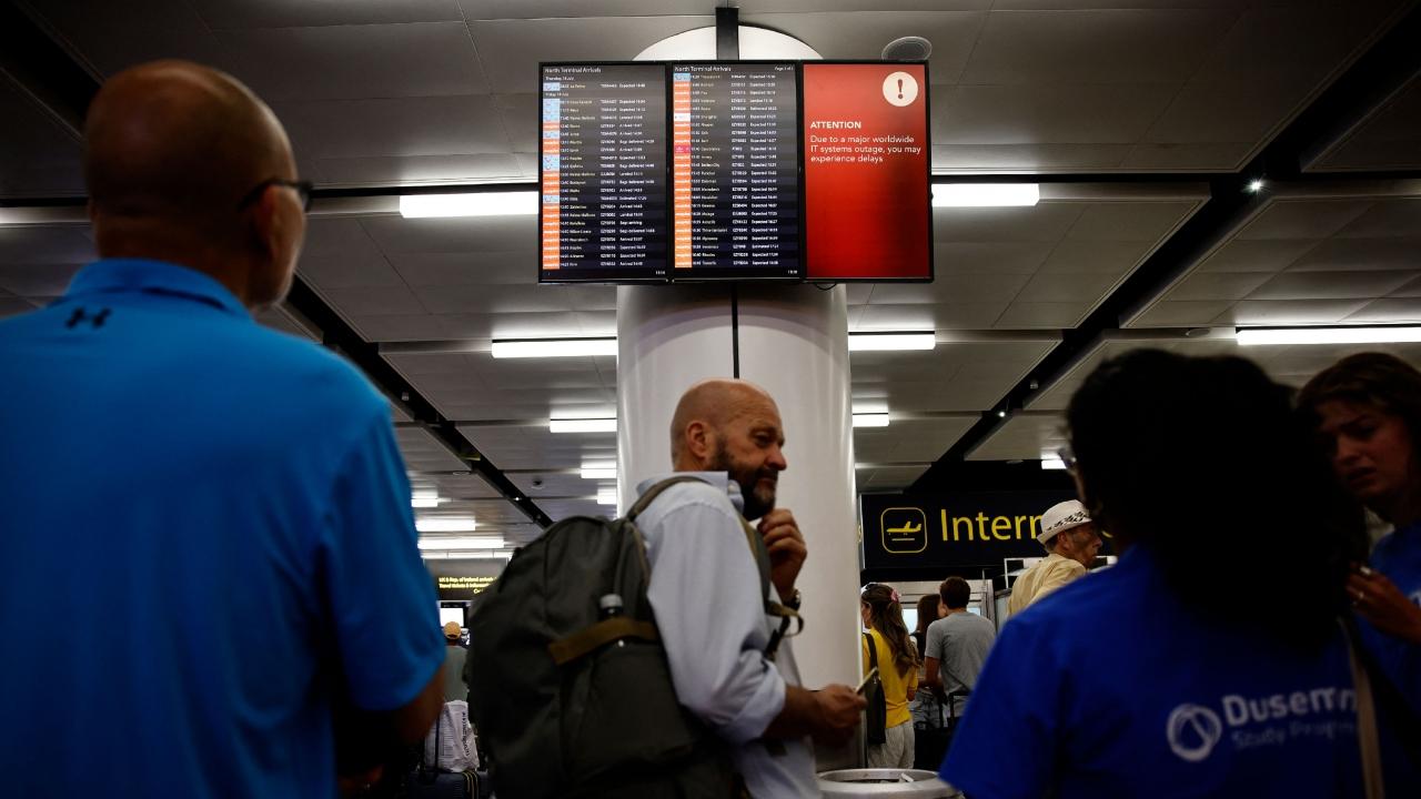 Airports including London Luton, Belfast and Edinburgh warned of longer waiting times for passengers because of the glitch