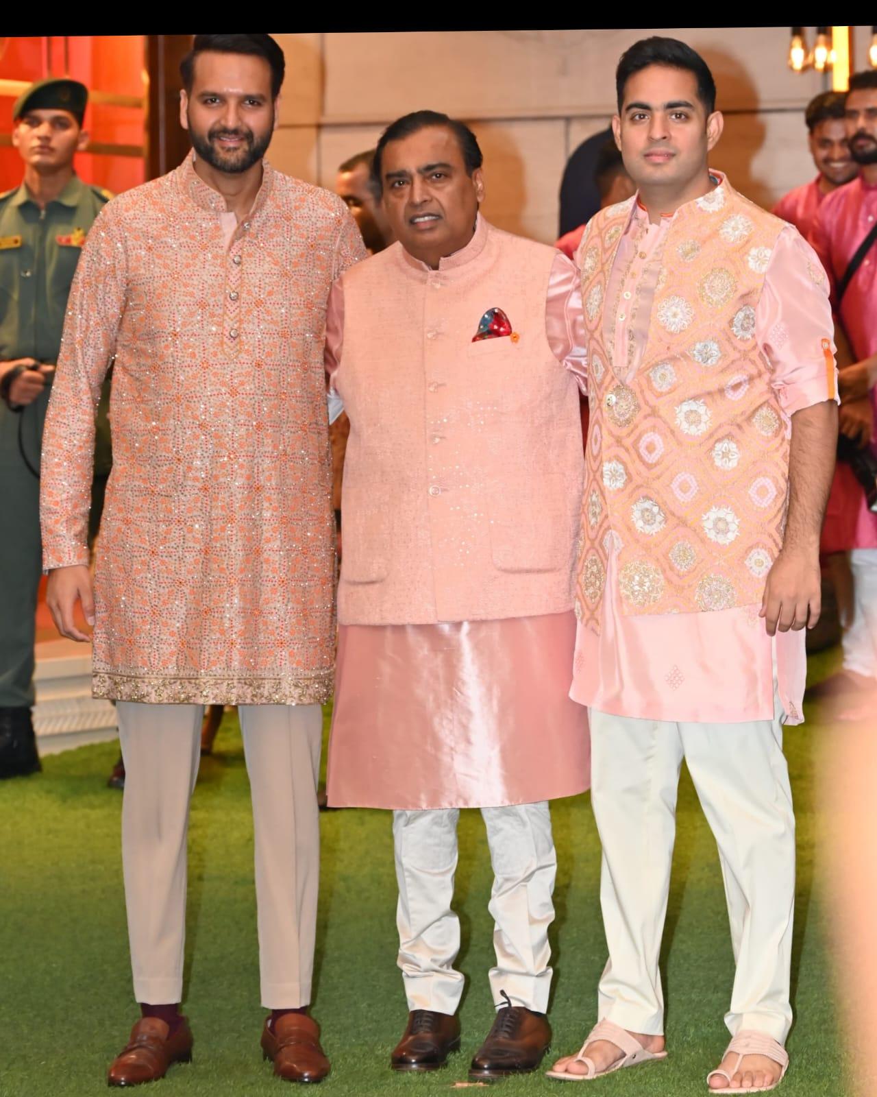 Akash Ambani, Mukesh Ambani, and Anand Piramal posed for a picture in matching outfits