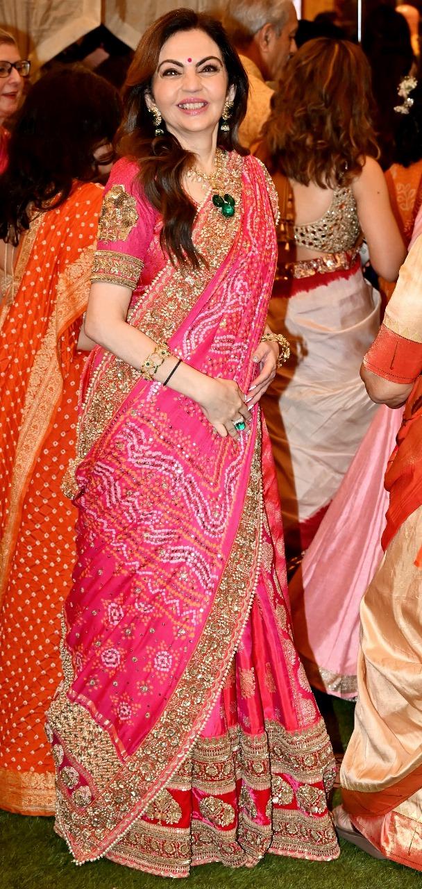 Nita Mukesh Ambani looked super stunning in a pink lehenga, with her hair styled in soft curls and adorned with intricate jewellery