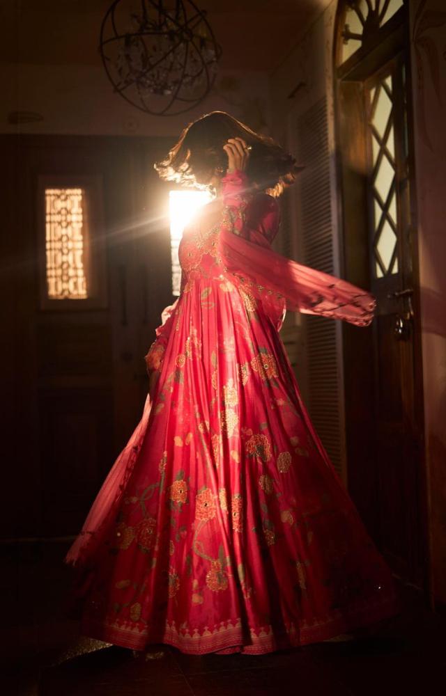 Mrunal opted for a beautiful red suit with flowers embroidered on it. The actress` suit featured mirror work