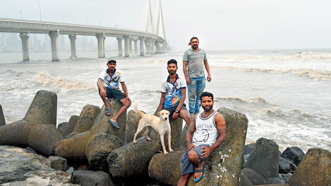 Akash Khapne (from left), Sandesh Mistry, Anwar Ali and Robin Willam were four out of the five who retrieved the body of Bhavesh Seth, the bussinessman who jumped off the Bandra-Worli Sea Link on July 17. Pic/Kirti Surve Parade