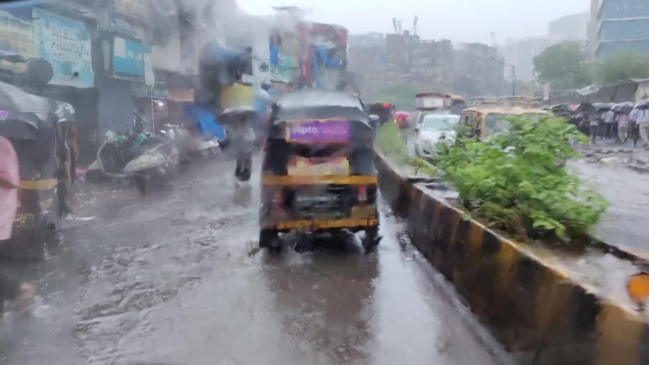 People sit in the auto-rickshaw but unfortunately have to deal with surrounding rickshaws while sitting in the fourth seat as they splash water due to rash riding.