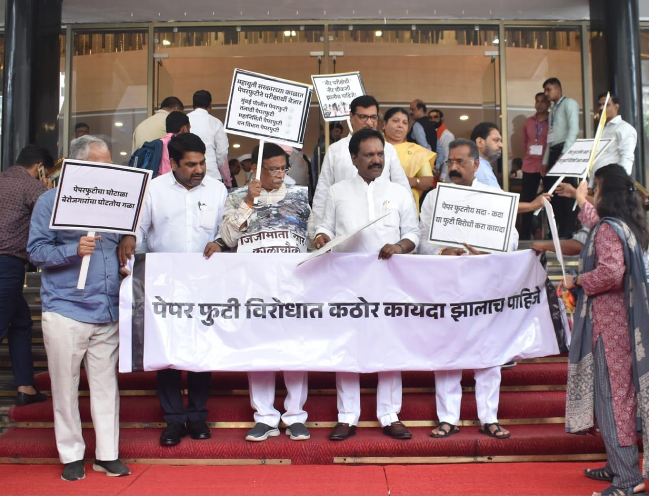The Opposition leaders raised slogans demanding a strict law to curb paper leaks and punish the guilty