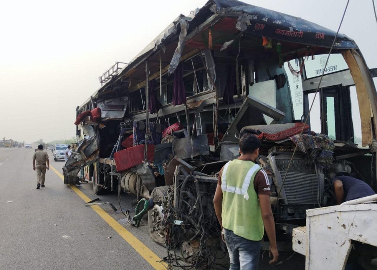 The impact of the collision left the front portion of the bus badly mangled with one side ripped open